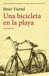 UNA BICICLETA EN LA PLAYA